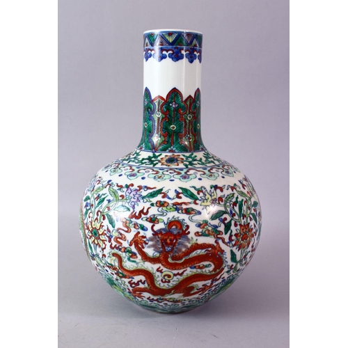 246 - A CHINESE DOUCAI DECORATED PORCELAIN DRAGON BOTTLE VASE, decorated with scenes of dragons amongst fo... 