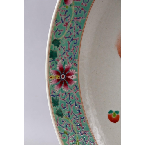 247 - A CHINESE FAMILLE ROSE PORCELAIN CHARGER, With decoration depicting displays of native flora, with b... 