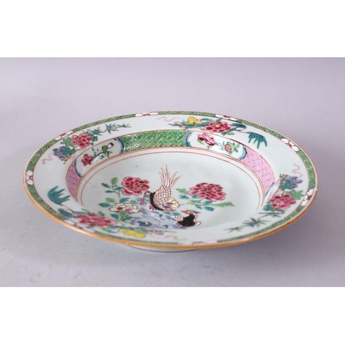 262 - AN 18TH CENTURY CHINESE FAMILLE ROSE CIRCULAR PLATE, painted with flowers and birds, 23cm diameter.