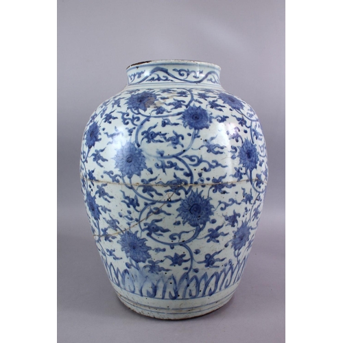 267 - A CHINESE MING DYNASTY BLUE & WHITE PORCELAIN JAR /  VASE, decorated with scrolling lotus decoration... 