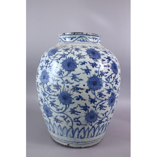 267 - A CHINESE MING DYNASTY BLUE & WHITE PORCELAIN JAR /  VASE, decorated with scrolling lotus decoration... 