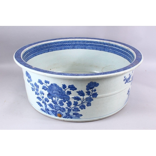 269 - A LARGE 18TH CENTURY CHINESE QIANLONG BLUE & WHITE PORCELAIN BASIN, decorated with views of village ... 