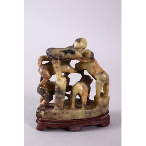 27 - A 20TH CENTURY CHINESE CARVED SOAPSTONE MONKEY GROUP, carved with five monkeys climbing upon one and... 