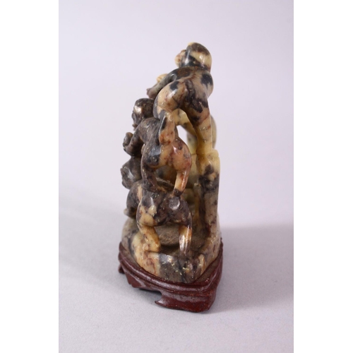 27 - A 20TH CENTURY CHINESE CARVED SOAPSTONE MONKEY GROUP, carved with five monkeys climbing upon one and... 