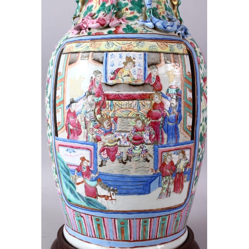 271 - A 19TH CENTURY CHINESE CANTON FAMILLE ROSE PORCELAIN VASE, decorated with two main panels of importa... 