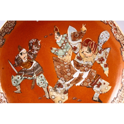 273 - A JAPANESE MEIJI PERIOD SATSUMA DISH, decorated with three warriors in raised enamel, 31.5cm diamete... 