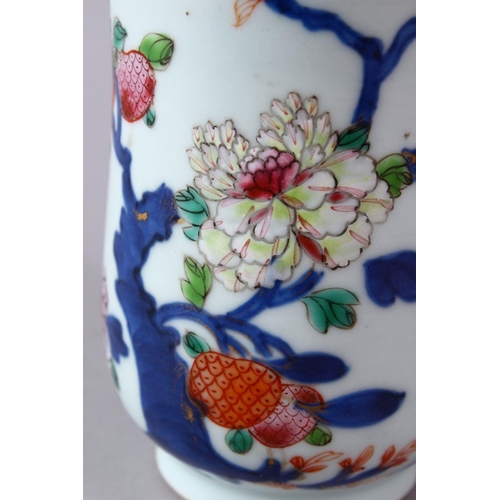 281 - A 18TH/19TH CENTURY CHINESE FAMILLE ROSE FLORAL DECORATED TANKARD, with a ruyi handle, 12.5cm high.