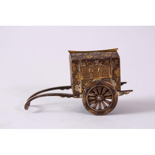 292 - A 19TH CENTURY JAPANESE GILT SILVER SALT SHAKER in the form of a rickshaw, with moulded decoration a... 