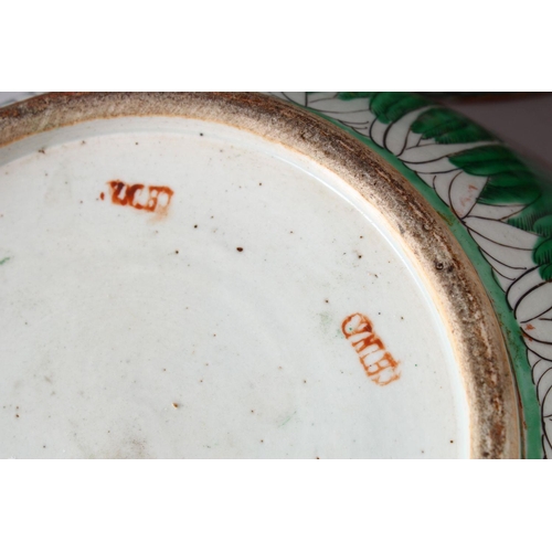 294 - THREE 19TH/20TH CENTURY CHINESE PORCELAIN CANTON BOWLS, decorated with butterflies, flora and symbol... 