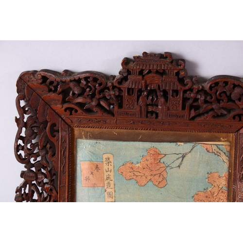 296 - A PAIR OF 19TH CENTURY CHINESE CARVED WOODEN FRAMES AND JAPANESE WOODBLOCK PRINTS, the frames carved... 