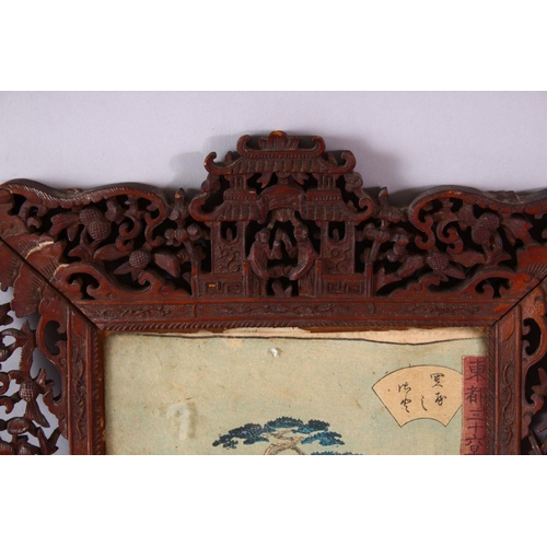 296 - A PAIR OF 19TH CENTURY CHINESE CARVED WOODEN FRAMES AND JAPANESE WOODBLOCK PRINTS, the frames carved... 