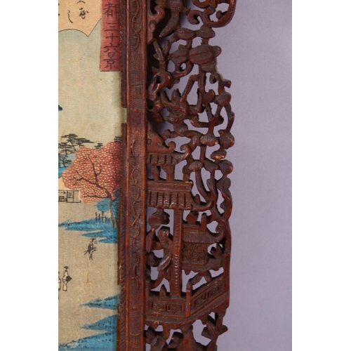 296 - A PAIR OF 19TH CENTURY CHINESE CARVED WOODEN FRAMES AND JAPANESE WOODBLOCK PRINTS, the frames carved... 