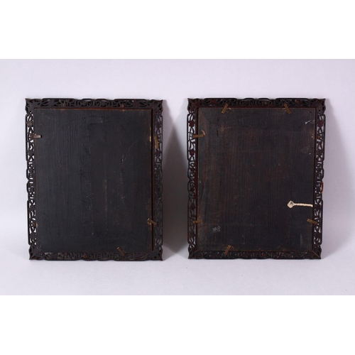 297 - A PAIR OF 19TH CENTURY CHINESE CARVED WOOD PICTURE FRAMES, carved with prunus and scroll decoration,... 