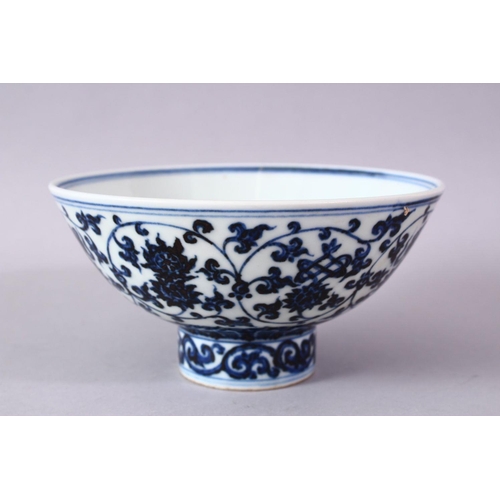 307 - A CHINESE MING STYLE BLUE & WHITE PORCELAIN BOWL, decorated with roundel depicting lotus and Buddhis... 