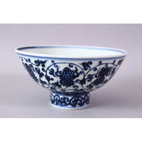 307 - A CHINESE MING STYLE BLUE & WHITE PORCELAIN BOWL, decorated with roundel depicting lotus and Buddhis... 