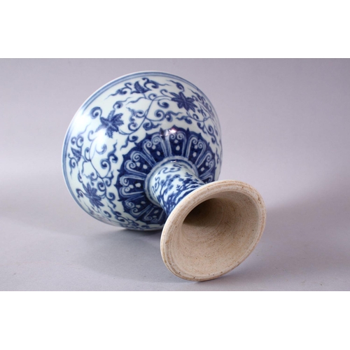 308 - A CHINESE BLUE & WHITE PORCELAIN STEM BOWL - FOR THE ISLAMIC MARKET, decorated with formal scrolling... 