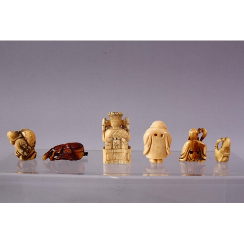 31 - A LOT OF SIX JAPANESE MEIJI PERIOD CARVED IVORY NETSUKE, one of a seated and inlaid goddess, 6cm, tw... 