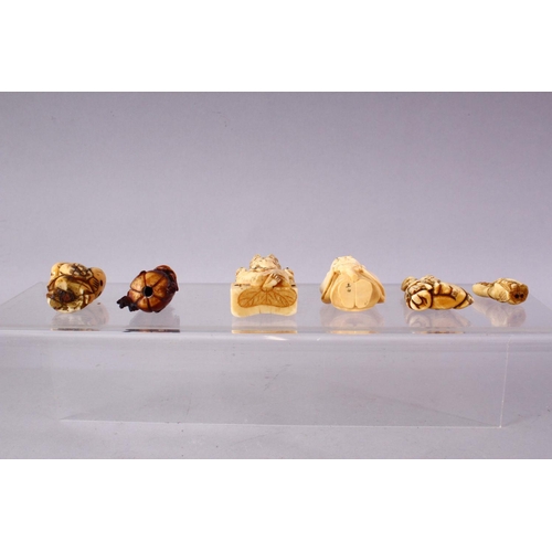 31 - A LOT OF SIX JAPANESE MEIJI PERIOD CARVED IVORY NETSUKE, one of a seated and inlaid goddess, 6cm, tw... 