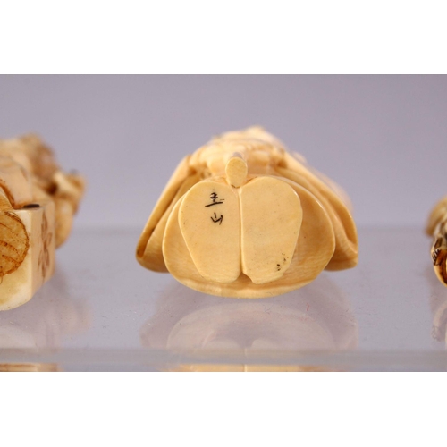 31 - A LOT OF SIX JAPANESE MEIJI PERIOD CARVED IVORY NETSUKE, one of a seated and inlaid goddess, 6cm, tw... 