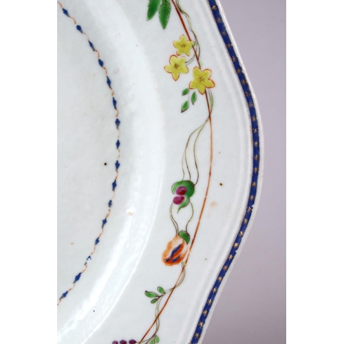 329 - A FINE CHINESE 18TH CENTURY FAMILLE ROSE EXPORT PORCELAIN SERVING DISH, with typical floral borders ... 