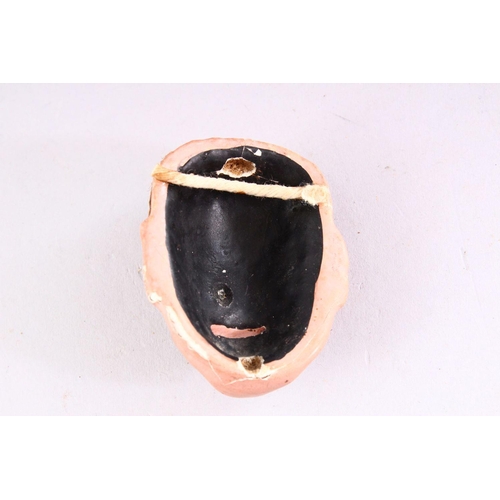 343 - TWO MINIATURE JAPANESE PAINTED PLASTER NOH MASKS, 6cm and 6.5cm high.