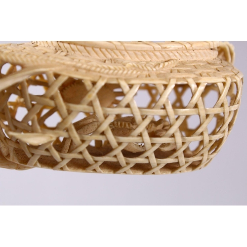 36 - A JAPANESE MEIJI PERIOD CARVED IVORY CRAB GROUP OKIMONO - depicting a basket of crabs with three fur... 