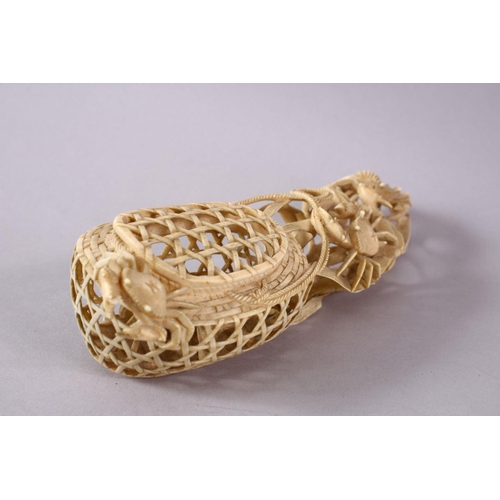 36 - A JAPANESE MEIJI PERIOD CARVED IVORY CRAB GROUP OKIMONO - depicting a basket of crabs with three fur... 