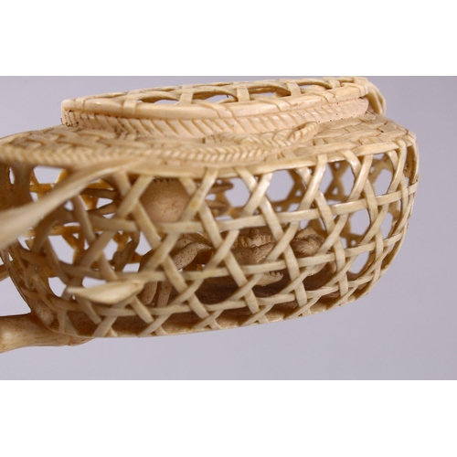 36 - A JAPANESE MEIJI PERIOD CARVED IVORY CRAB GROUP OKIMONO - depicting a basket of crabs with three fur... 