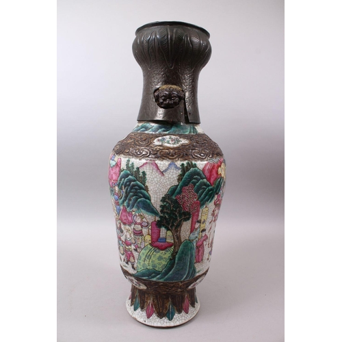 37 - A 19TH CENTURY CHINESE FAMILLE ROSE CRACKLE GLAZED PORCELAIN VASE, painted with a battle scene, the ... 