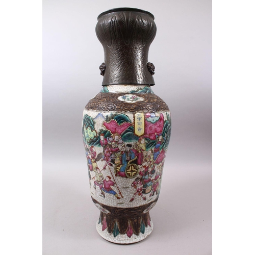 37 - A 19TH CENTURY CHINESE FAMILLE ROSE CRACKLE GLAZED PORCELAIN VASE, painted with a battle scene, the ... 