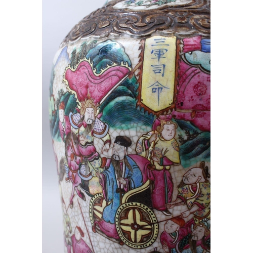 37 - A 19TH CENTURY CHINESE FAMILLE ROSE CRACKLE GLAZED PORCELAIN VASE, painted with a battle scene, the ... 