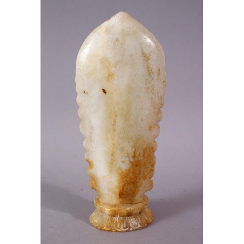 40 - A 19TH / 20TH CENTURY CHINESE CARVED WHITE JADE / SOAPSTONE FIGURE OF A DEITY / BUDDHA, stood upon a... 