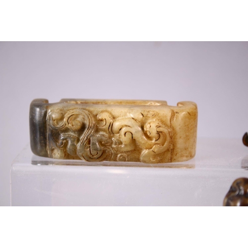 41 - A MIXED LOT OF EIGHT CARVED CHINESE JADE ITEMS, consisting of: A carved jade chilong belt hook, 9cm,... 