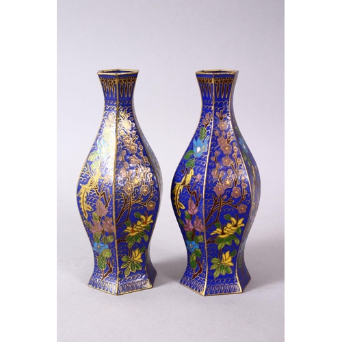 43 - A 19TH / 20TH CENTURY CHINESE CLOISONNE VASES, with wirework depicting floral spray upon a blue grou... 