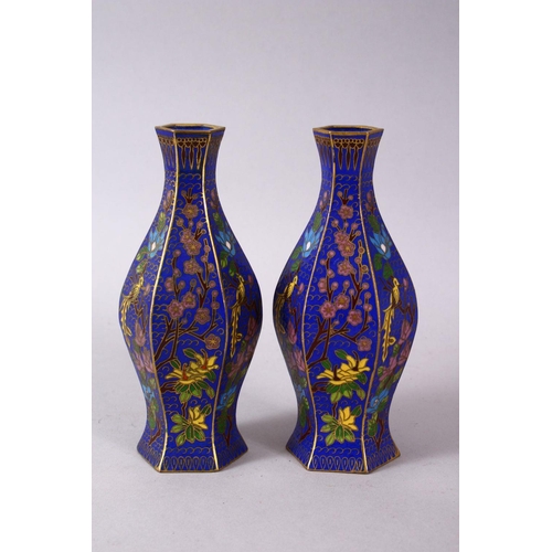 43 - A 19TH / 20TH CENTURY CHINESE CLOISONNE VASES, with wirework depicting floral spray upon a blue grou... 