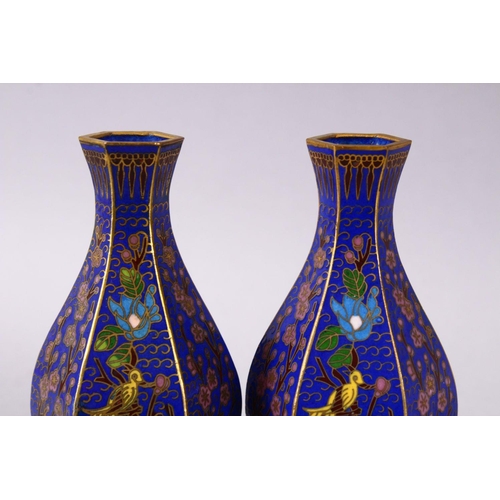 43 - A 19TH / 20TH CENTURY CHINESE CLOISONNE VASES, with wirework depicting floral spray upon a blue grou... 