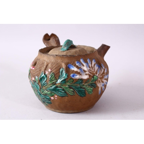 47 - A JAPANESE BANKO STYLE POTTERY ENAMEL TEAPOT, with floral enamel decoration, 15cm.