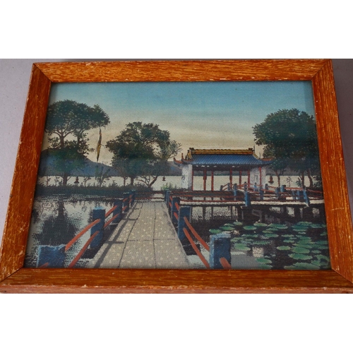 48 - A SET OF THREE CHINESE REPUBLIC STYLE  TAPESTRY PICTURES, each depicting a waterside landscape scene... 