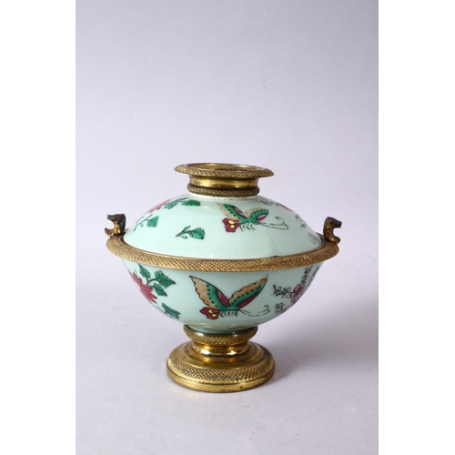 51 - A CHINESE 19TH / 20TH CENTURY CELADON METAL MOUNTED  BOWL AND COVER, the bowl with a celadon ground ... 