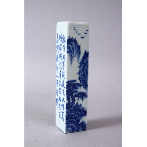 54 - A CHINESE BLUE & WHITE PORCELAIN SCHOLARS WAX SEAL, the body decorated with landscape views and call... 