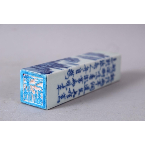 54 - A CHINESE BLUE & WHITE PORCELAIN SCHOLARS WAX SEAL, the body decorated with landscape views and call... 