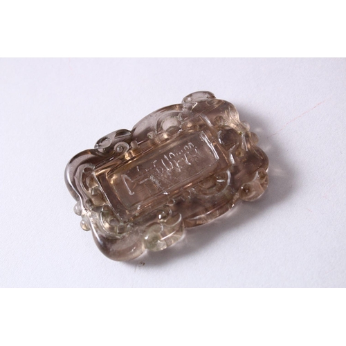 56 - A CHINESE 19TH / 20TH CENTURY CARVED ROCK CRYSTAL PENDANT, carved in openwork with calligraphy, boxe... 