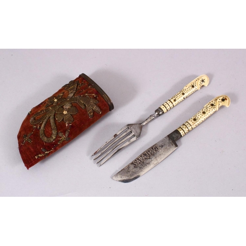 601 - AN OTTOMAN BALKANS KNIFE AND FORK IN VELVET SCABBARD, with bone handles and inlaid brass stud, the b... 