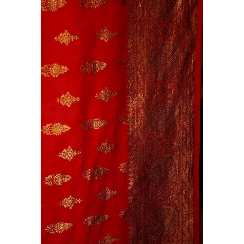 604 - A VERY FINE 19TH CENTURY INDIAN GOLD INLAID SILK TEXTILE, with fine gold embroidery with motif decor... 