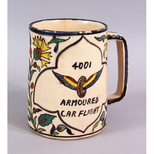 606 - AN UNUSUAL JERUSALEM ARMINIAN GLAZED POTTERY TANKARD, Painted with floral spray and a panel of writi... 