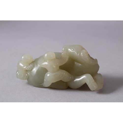 61 - A CHINESE CARVED JADE FIGURE OF AN OXEN AND ATTENDANTs, The oxen in a recumbent position with two yo... 