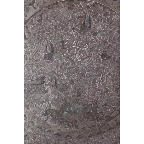 616 - A MONUMENTAL INDIAN ENGRAVED METAL TRAY, with pierced border, 98cm diameter.