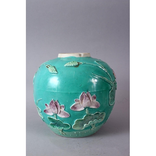 69 - A CHINESE TURQUOISE GROUND PORCELAIN GINGER JAR, with raised relief decoration of a crane amongst lo... 