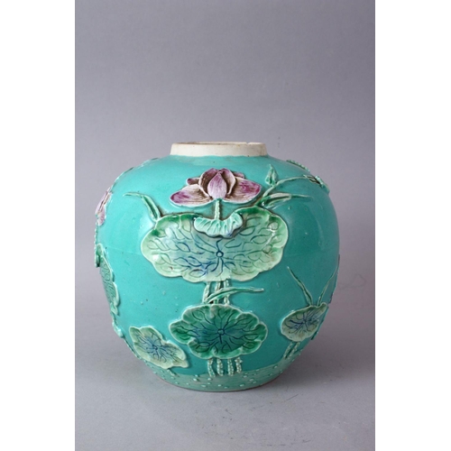 69 - A CHINESE TURQUOISE GROUND PORCELAIN GINGER JAR, with raised relief decoration of a crane amongst lo... 