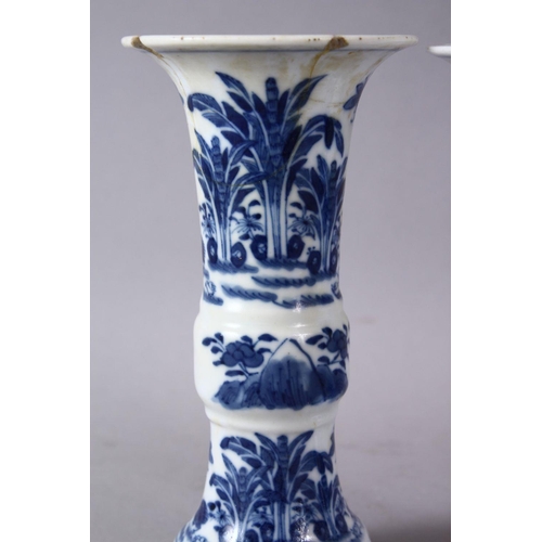 70 - A PAIR OF 19TH CENTURY OR LATER CHINESE BLUE & WHITE PORCELAIN GU VASES, The body of the vases decor... 